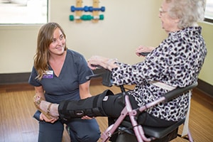 A nurse helping an injured woman